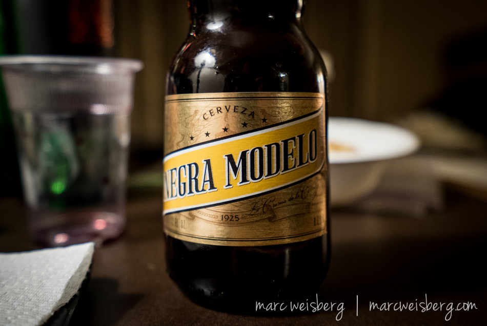I don't drink beer often but when I do...I drink Negra Modelo:  a7s, 16-35mm f4 ZA OSS, ISO 4000 {not a typo}, f4, 1/60th sec.  Super clean at 4k ISO.