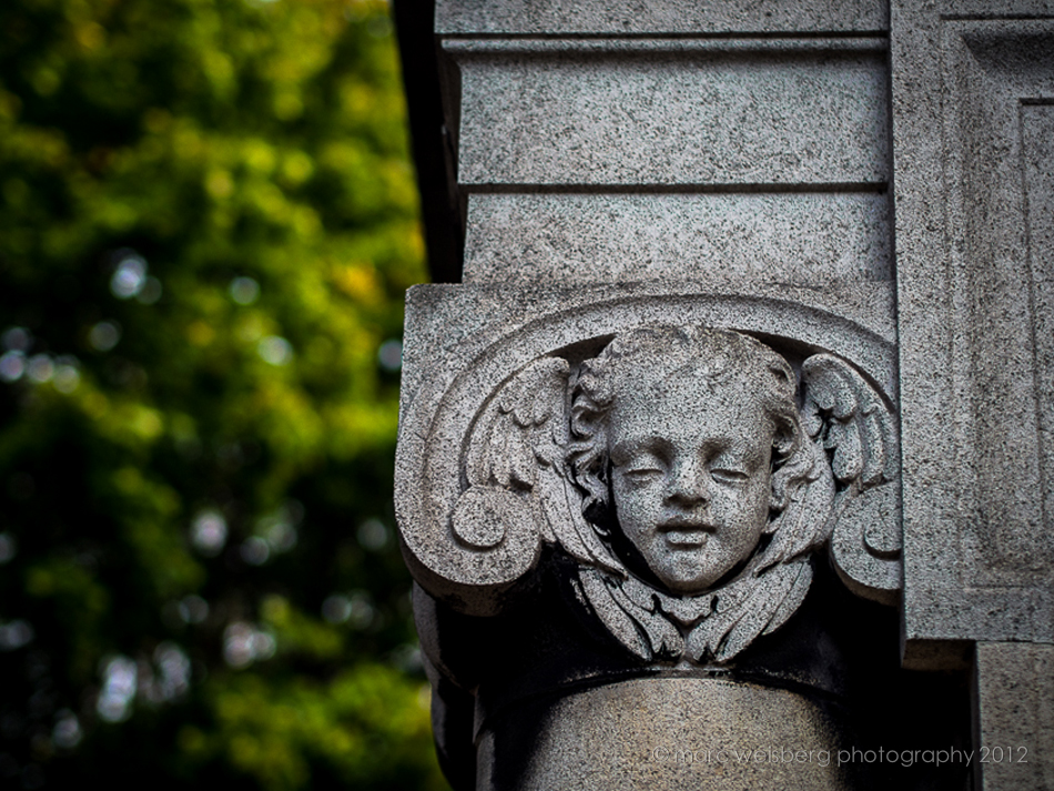 hand carved angel, granite, pere lachaise cemetery, paris, picture