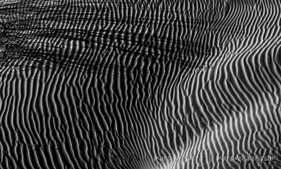 Working the Mesquite shadows and sand patterns in the dunes.  Sony a7II, 70-200mm f4 G OSS, 145mm, ISO 100, f18, 1/60th sec.